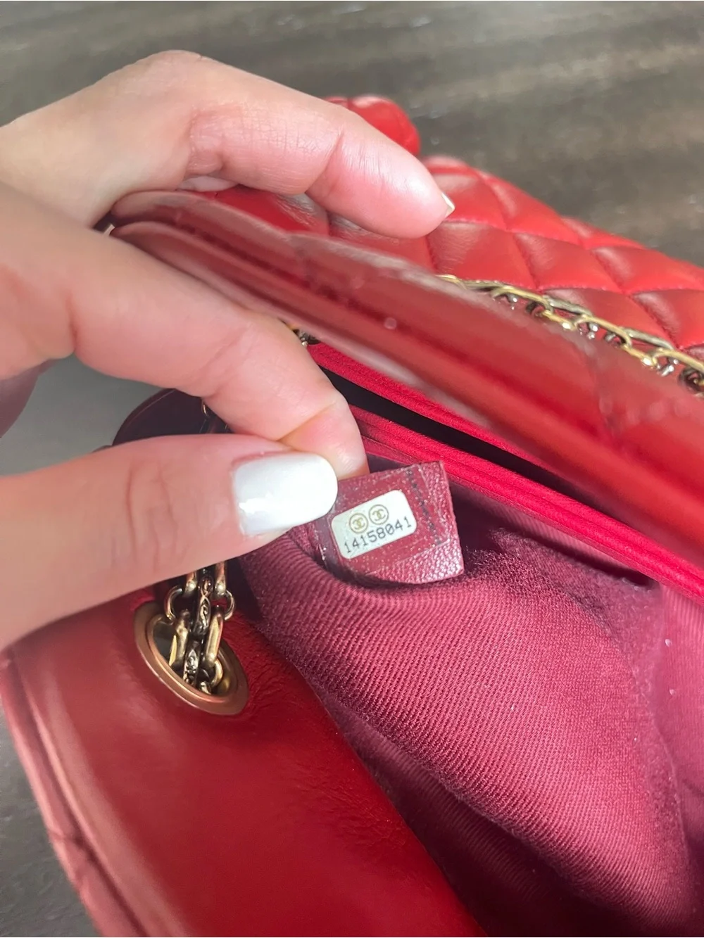 CHANEL Red Quilted Leather Shoulder Bag with Gold Chain and CC Charm